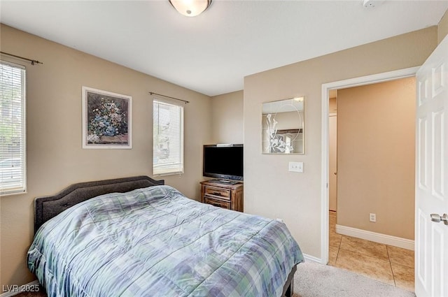 967 Coronado Peak Ave, Las Vegas, NV 89183 - bedroom with multiple windows and light tile patterned floors