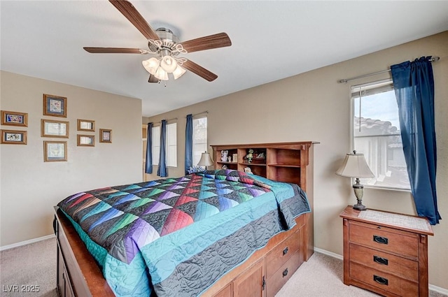 967 Coronado Peak Ave, Las Vegas, NV 89183 - bedroom featuring light carpet, multiple windows, and a ceiling fan