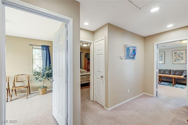 967 Coronado Peak Ave, Las Vegas, NV 89183 - hallway with light colored carpet and recessed lighting