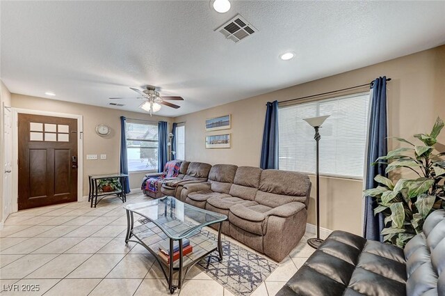 967 Coronado Peak Ave, Las Vegas, NV 89183 - living area with light tile patterned flooring, a ceiling fan, recessed lighting, and a textured ceiling