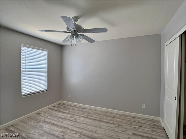 9604 Vital Crest St, Las Vegas, NV 89123 - empty room featuring light wood-style floors and a ceiling fan
