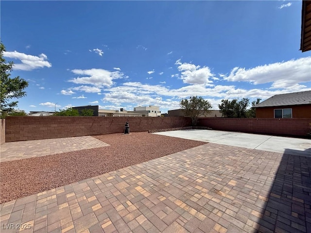 9604 Vital Crest St, Las Vegas, NV 89123 - fenced backyard featuring a patio area