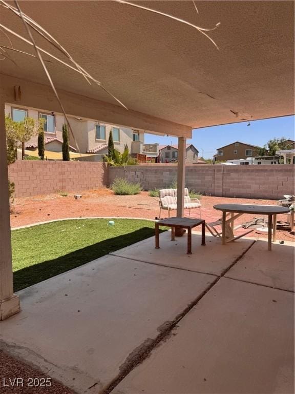3644 Valley Dr, North Las Vegas, NV 89032 - fenced backyard featuring a patio