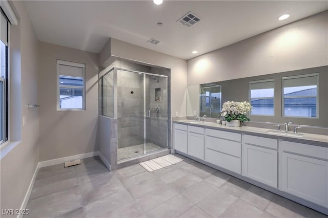 8984 Rolling Pietra St, Las Vegas, NV 89166 - full bathroom with a stall shower, double vanity, recessed lighting, and tile patterned flooring