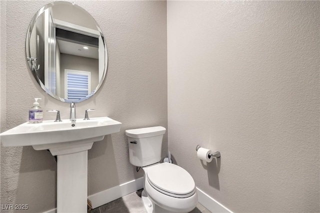 8984 Rolling Pietra St, Las Vegas, NV 89166 - half bathroom featuring a textured wall