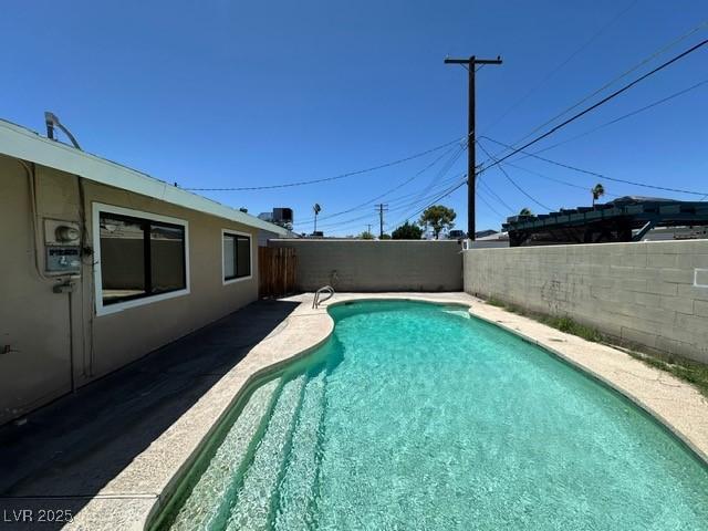 4200 Via Vaquero Ave, Las Vegas, NV 89102 - view of swimming pool featuring a fenced backyard and a patio