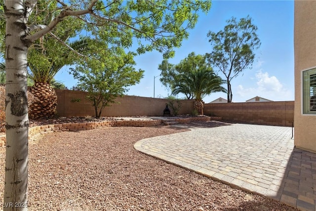 9004 Harbor Wind Ave, Las Vegas, NV 89178 - fenced backyard featuring a patio area