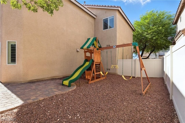 9004 Harbor Wind Ave, Las Vegas, NV 89178 - view of jungle gym with a fenced backyard