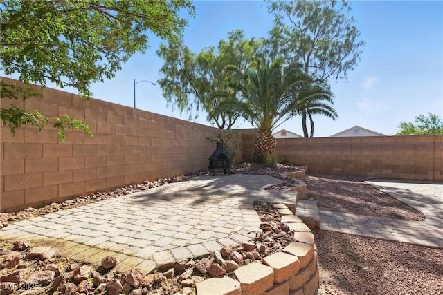 9004 Harbor Wind Ave, Las Vegas, NV 89178 - fenced backyard with a patio