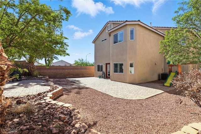9004 Harbor Wind Ave, Las Vegas, NV 89178 - rear view of house with a patio, a fenced backyard, and stucco siding