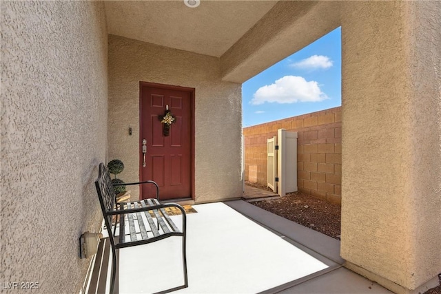 9004 Harbor Wind Ave, Las Vegas, NV 89178 - doorway to property with stucco siding