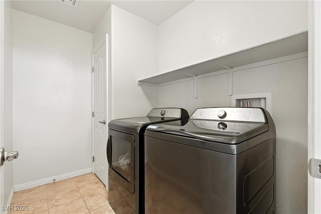 9004 Harbor Wind Ave, Las Vegas, NV 89178 - laundry area featuring washing machine and dryer and baseboards