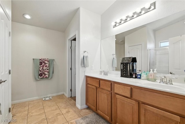 9004 Harbor Wind Ave, Las Vegas, NV 89178 - full bath with double vanity, a shower with door, and tile patterned flooring