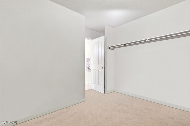 9004 Harbor Wind Ave, Las Vegas, NV 89178 - unfurnished bedroom featuring carpet floors and baseboards
