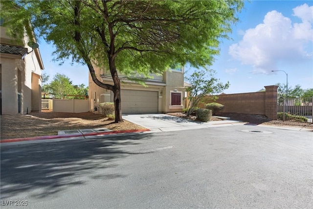 9004 Harbor Wind Ave, Las Vegas, NV 89178 - view of front of house with driveway, a garage, and stucco siding