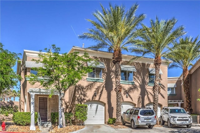 801 Dana Hills Ct Unit 101, Las Vegas, NV 89134 - view of property with concrete driveway and an attached garage
