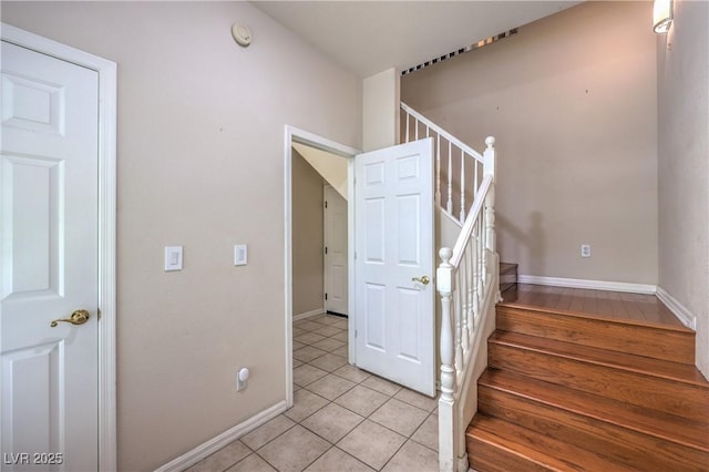 801 Dana Hills Ct Unit 101, Las Vegas, NV 89134 - stairway featuring tile patterned floors and baseboards