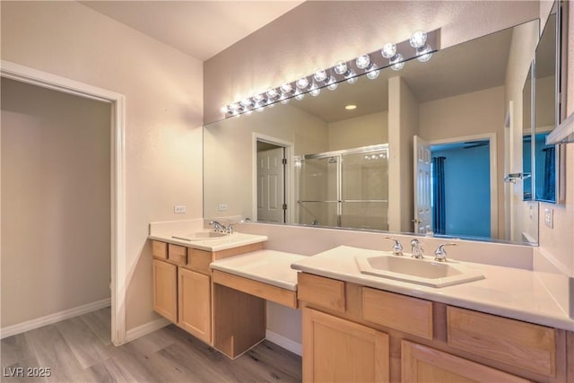 801 Dana Hills Ct Unit 101, Las Vegas, NV 89134 - full bathroom featuring double vanity, a stall shower, and wood finished floors