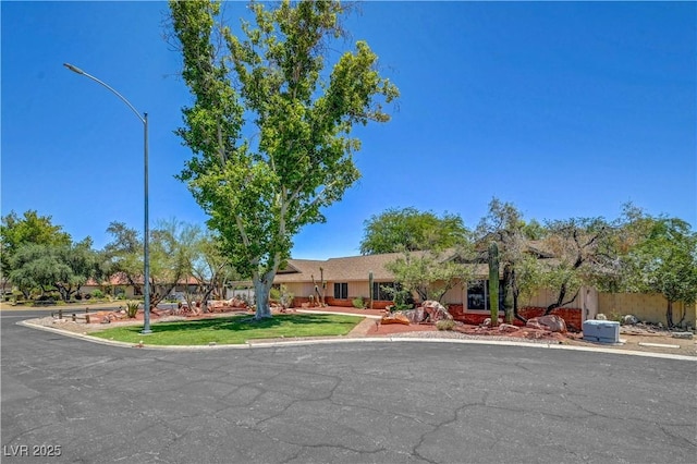 1705 Westwind Rd, Las Vegas, NV 89146 - view of front of home featuring a front lawn