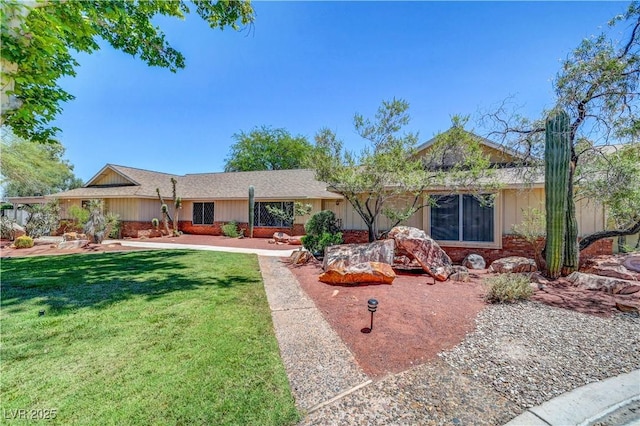1705 Westwind Rd, Las Vegas, NV 89146 - ranch-style home with a front lawn and brick siding