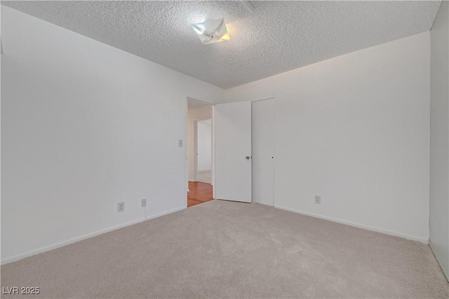 1705 Westwind Rd, Las Vegas, NV 89146 - carpeted empty room with a textured ceiling