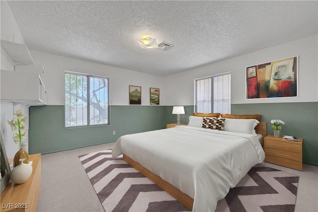1705 Westwind Rd, Las Vegas, NV 89146 - carpeted bedroom with a textured ceiling