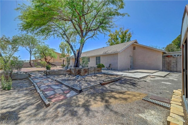 1705 Westwind Rd, Las Vegas, NV 89146 - back of house featuring a patio and stucco siding