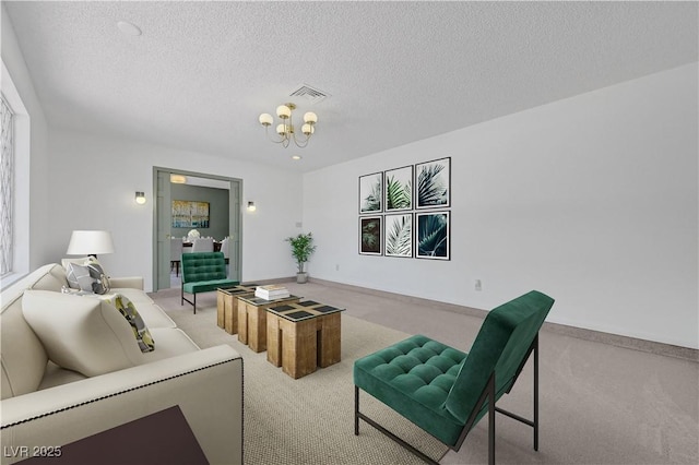 1705 Westwind Rd, Las Vegas, NV 89146 - living room with carpet floors, a chandelier, a textured ceiling, and plenty of natural light