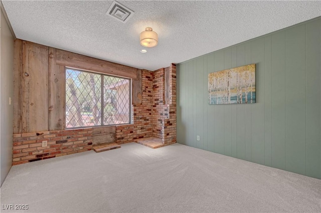 1705 Westwind Rd, Las Vegas, NV 89146 - carpeted spare room with a textured ceiling