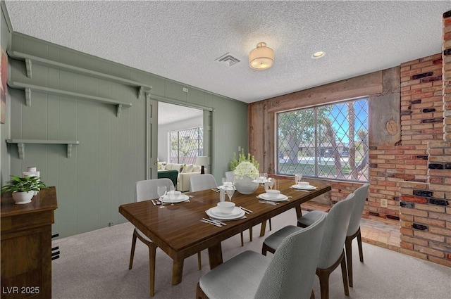 1705 Westwind Rd, Las Vegas, NV 89146 - carpeted dining area featuring a textured ceiling