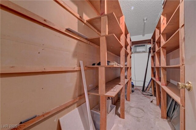 1705 Westwind Rd, Las Vegas, NV 89146 - storage room with a wall mounted air conditioner