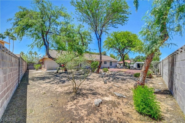 1705 Westwind Rd, Las Vegas, NV 89146 - rear view of house with a fenced backyard