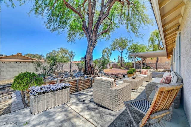 1705 Westwind Rd, Las Vegas, NV 89146 - fenced backyard featuring an outdoor hangout area and a patio area