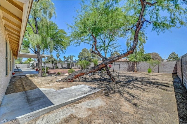1705 Westwind Rd, Las Vegas, NV 89146 - fenced backyard with a patio