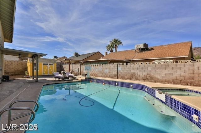 722 Barrie Ct, Henderson, NV 89002 - view of swimming pool with a fenced backyard, a storage shed, a patio area, and a pool with connected hot tub