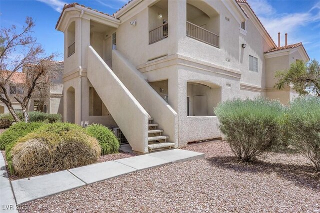 1881 W Alexander Rd Unit 2093, North Las Vegas, NV 89032 - view of building exterior featuring stairway