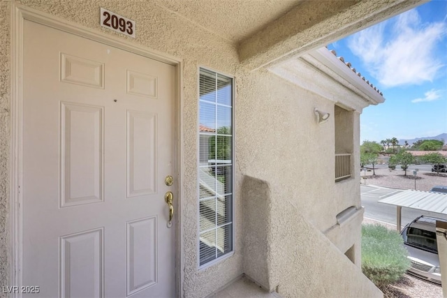 1881 W Alexander Rd Unit 2093, North Las Vegas, NV 89032 - property entrance with stucco siding