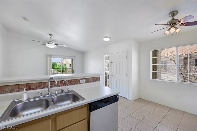 1881 W Alexander Rd Unit 2093, North Las Vegas, NV 89032 - kitchen with a ceiling fan, white dishwasher, light countertops, light tile patterned floors, and vaulted ceiling
