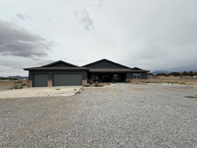 1830 Justine Ct, Pahrump, NV 89048 - view of front of house with driveway and an attached garage