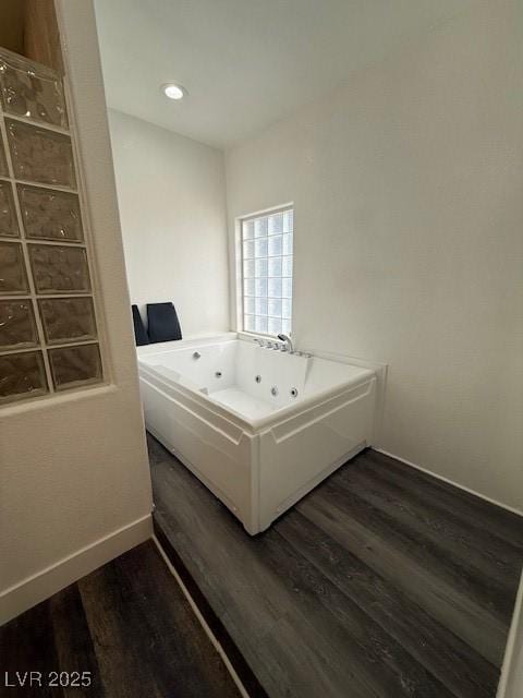 1830 Justine Ct, Pahrump, NV 89048 - bathroom with wood finished floors and a whirlpool tub