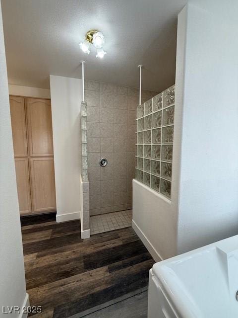 1830 Justine Ct, Pahrump, NV 89048 - bathroom featuring walk in shower and wood finished floors