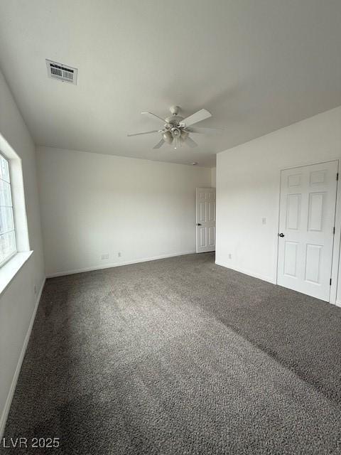 1830 Justine Ct, Pahrump, NV 89048 - unfurnished room with ceiling fan and dark colored carpet