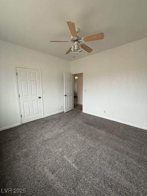 1830 Justine Ct, Pahrump, NV 89048 - unfurnished bedroom with dark colored carpet and ceiling fan