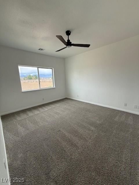 1830 Justine Ct, Pahrump, NV 89048 - spare room featuring ceiling fan and carpet flooring
