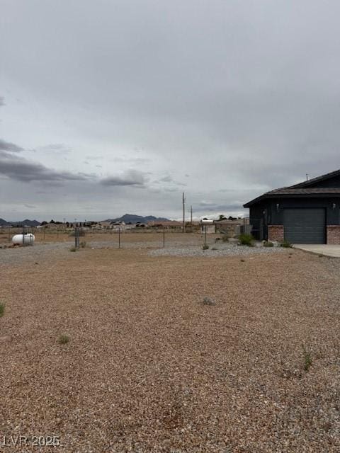 1830 Justine Ct, Pahrump, NV 89048 - view of yard with a garage