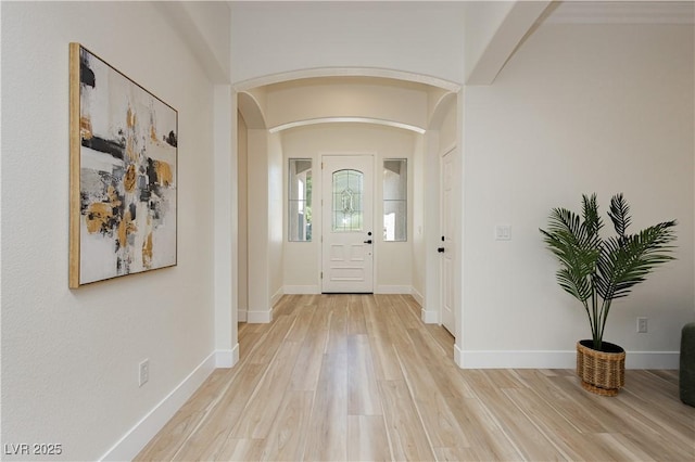 4493 Rometta Ave, Las Vegas, NV 89141 - entryway featuring arched walkways and light wood-style flooring