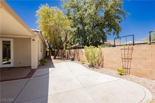 4493 Rometta Ave, Las Vegas, NV 89141 - fenced backyard featuring a patio