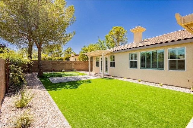 4493 Rometta Ave, Las Vegas, NV 89141 - fenced backyard with a patio