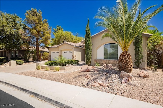 4493 Rometta Ave, Las Vegas, NV 89141 - mediterranean / spanish-style home with a garage, a tiled roof, stucco siding, and concrete driveway