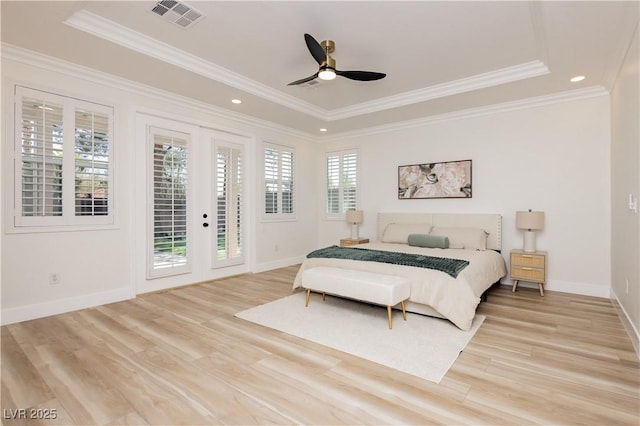 4493 Rometta Ave, Las Vegas, NV 89141 - bedroom featuring light wood-style floors, access to exterior, french doors, a raised ceiling, and ornamental molding